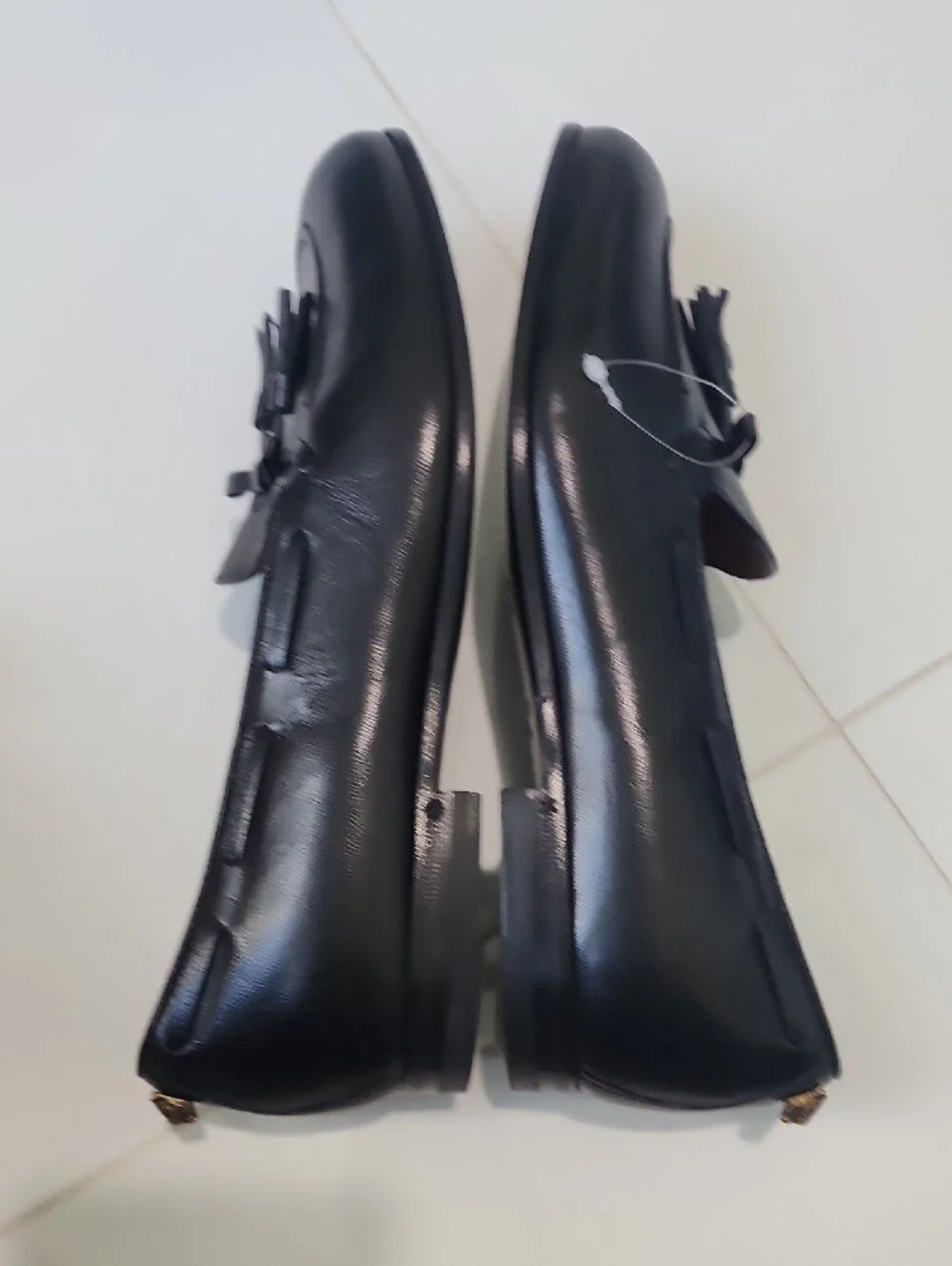 Gucci Black Leather Tassel Loafers with Gold Cat Accent